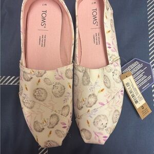 TOMS Cream Slip-Ons with Hedgehog Design